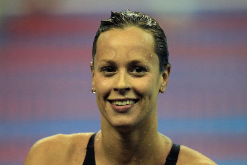 SHANGHAI, CHINA - JULY 24: Federica Pellegrini of Italy smiles after winning the gold medal in the Women's 400m Freestyle Final during Day Nine of the 14th FINA World Championships at the Oriental Sports Center on July 24, 2011 in Shanghai, China.  (Photo by Ezra Shaw/Getty Images)